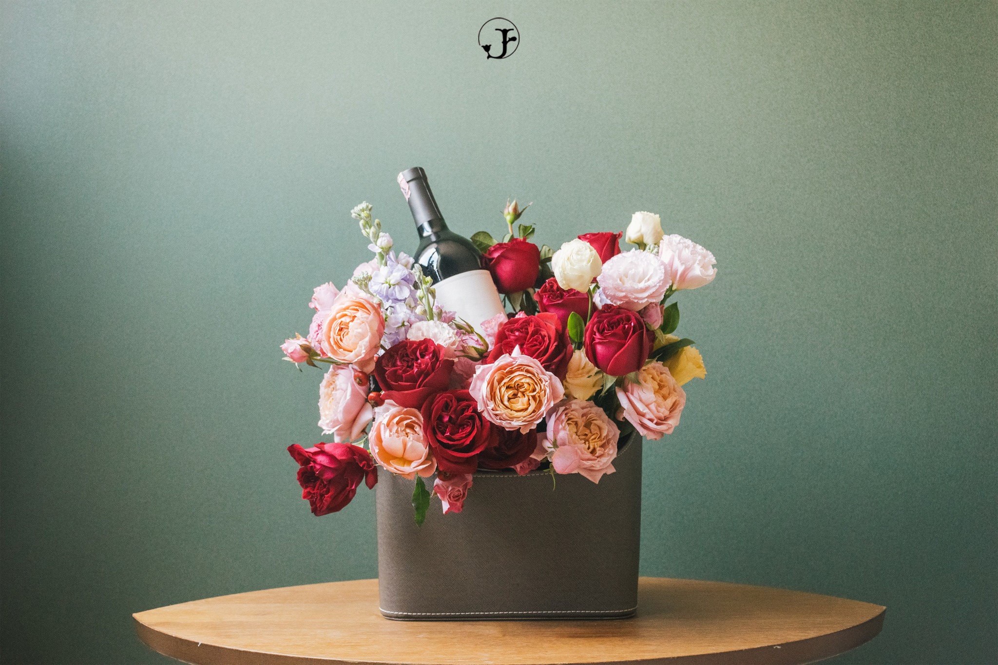 Flower basket with wine bottle